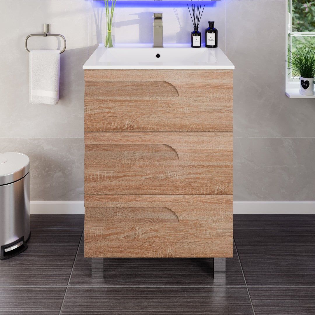 A modern bathroom vanity with a maple finish and a white porcelain top, featuring an integrated sink and soft-closing drawers.