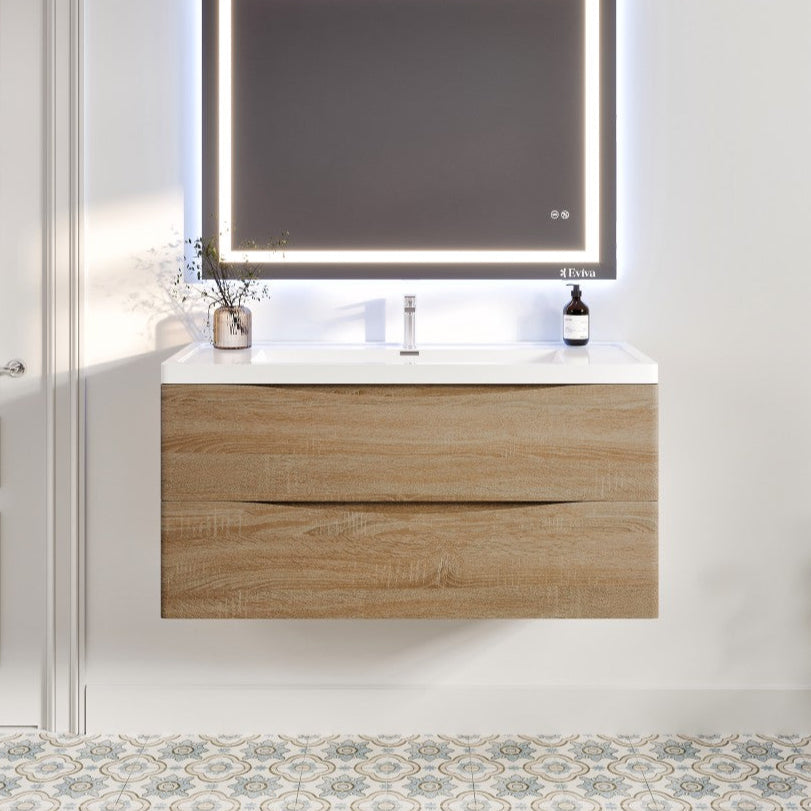 A white oak wall mount single sink bath vanity with an acrylic top and integrated sink, featuring a modern design with two soft-closing drawers and a mirror above it.