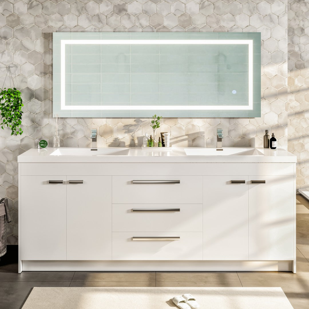 Modern white double sink bathroom vanity with acrylic top and integrated sinks, featuring a large mirror above the vanity, placed against a tiled wall.