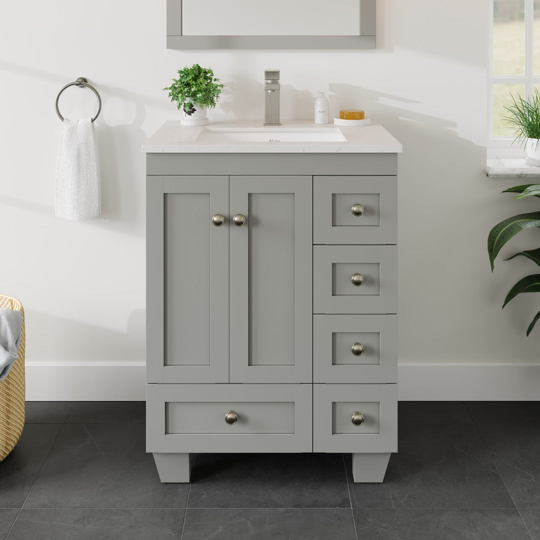 A gray single sink bath vanity with a Carrara quartz top and undermount porcelain sink, featuring five drawers and two doors with a sleek and modern design.