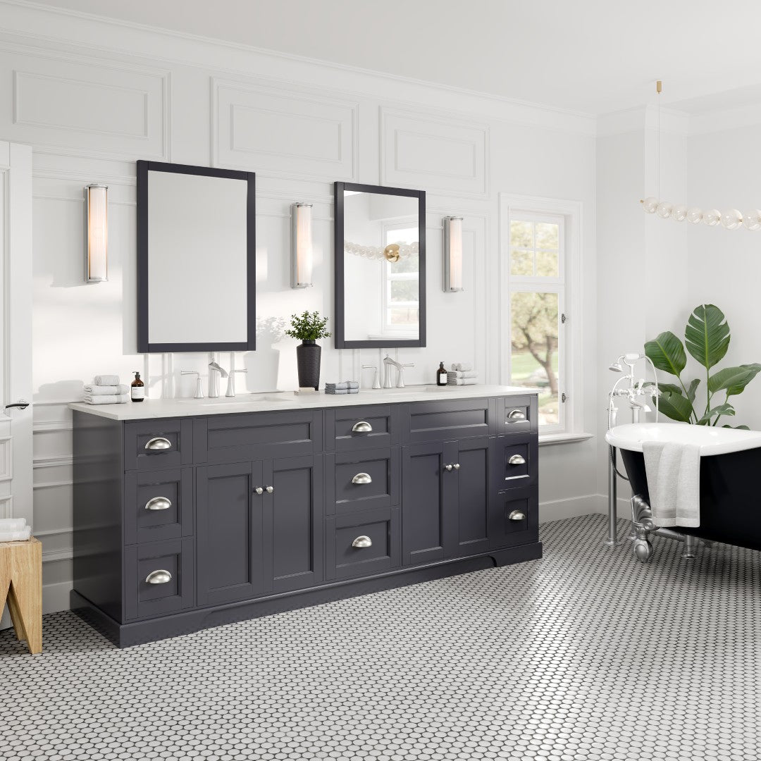 Charcoal gray double sink bath vanity with Carrara quartz top and undermount porcelain sinks, featuring stainless steel handles and two mirrors above the sinks.