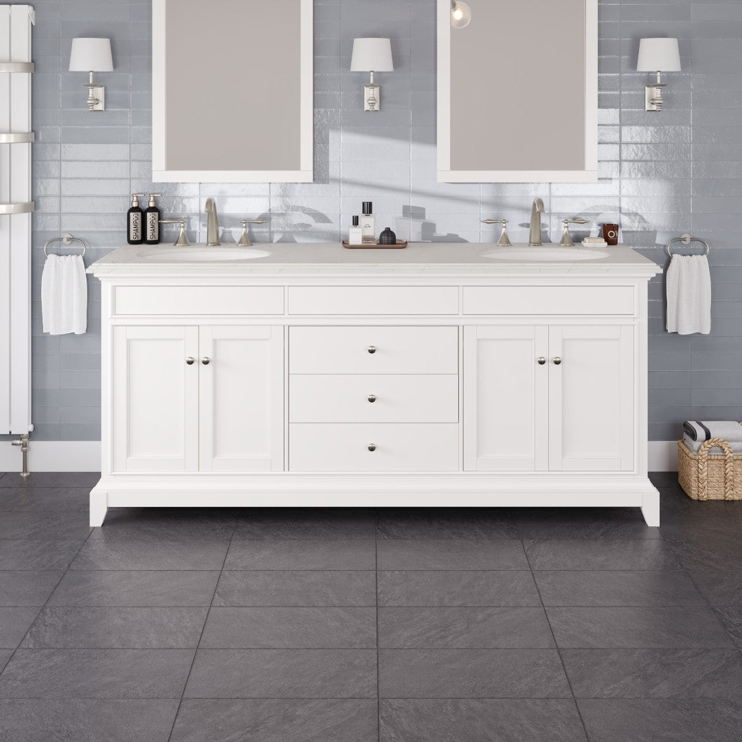 A traditional white double sink bathroom vanity with a Carrara quartz countertop, depicted in a stylish bathroom setting.