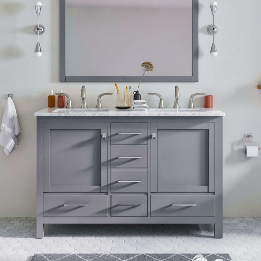 A gray Aberdeen bathroom vanity with a white quartz countertop and undermount sink, featured in a bathroom setting with wall-mounted lights and a mirror above the vanity.
