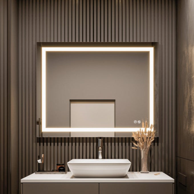 Modern bathroom vanity with a rectangular LED-backlit mirror above a white vessel sink and a gray cabinet.