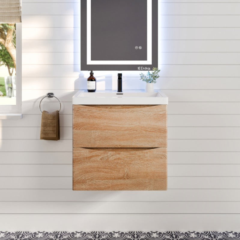 A modern white oak wall mount single sink bath vanity with an acrylic top and integrated sink, featuring a wall-mounted design with a mirror above it in a bathroom setting.