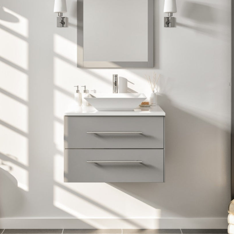 A modern gray wall mount single sink bath vanity with a white quartz top and vessel porcelain sink, accompanied by a mirror and wall-mounted lights.