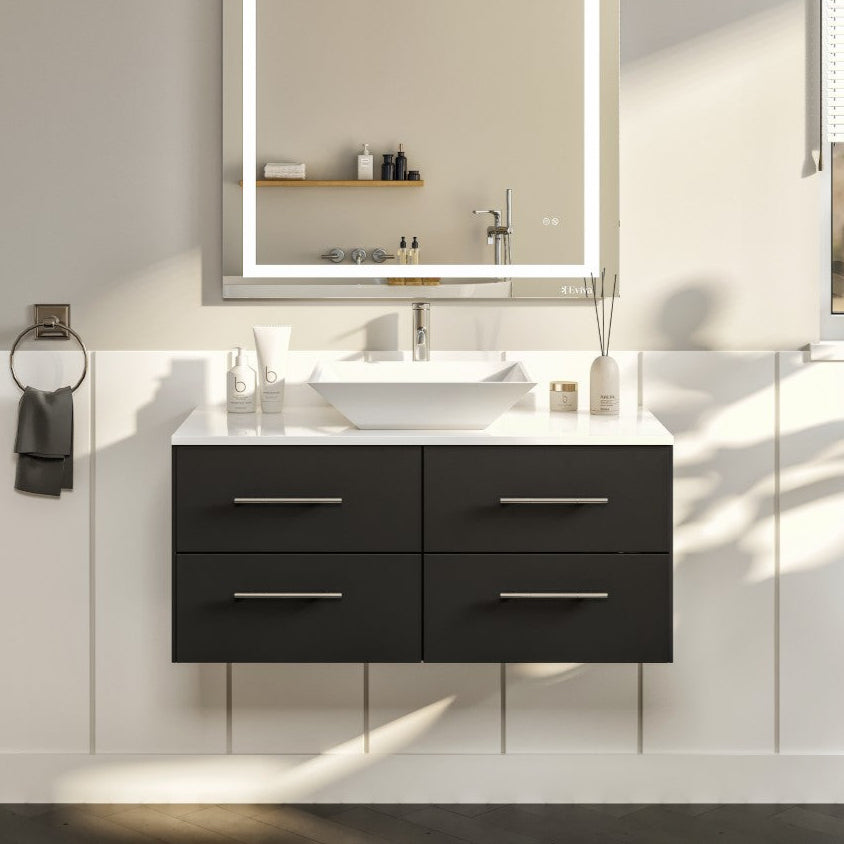 A modern Wave 30 inch espresso wall mount single sink bath vanity with a white quartz top and vessel porcelain sink, accompanied by a mirror with a built-in light strip above the vanity.