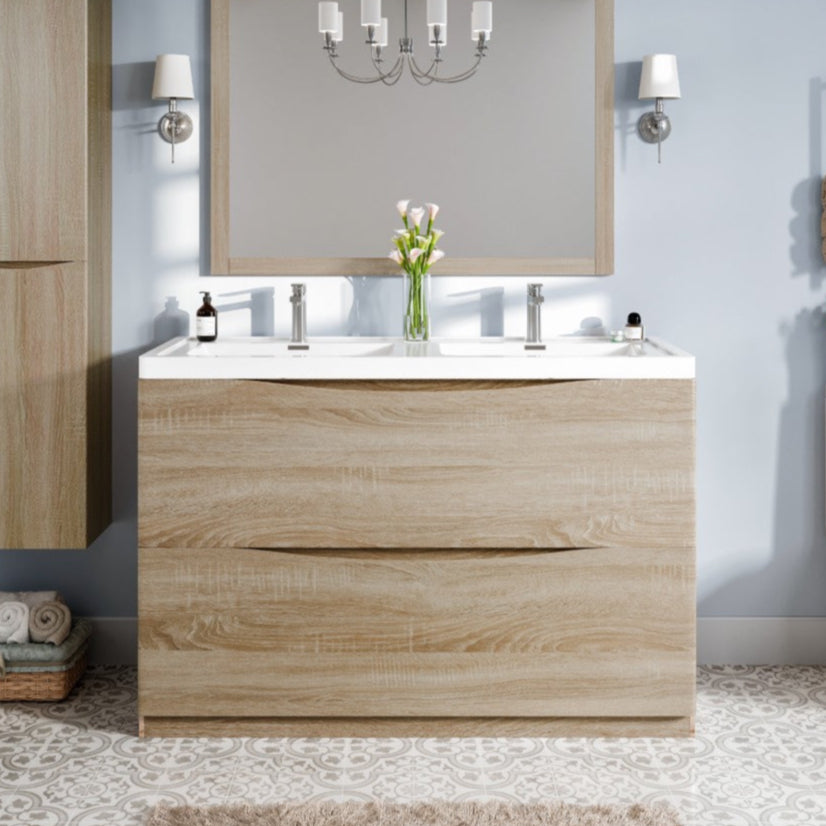 Modern freestanding double sink bathroom vanity with white oak finish and acrylic countertop, featuring integrated sinks and two soft-closing drawers. The image displays the vanity in a stylish bathroom setting, highlighting its design and functionality.