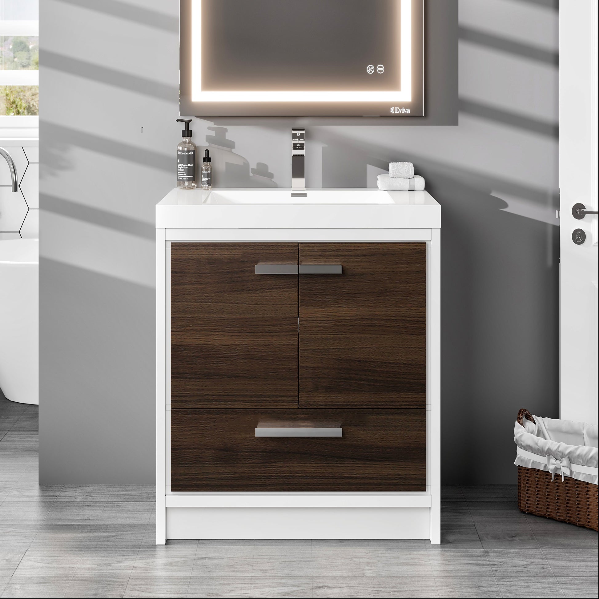 Bathroom vanity with wooden cabinets and a mirror above in a modern bathroom setting.